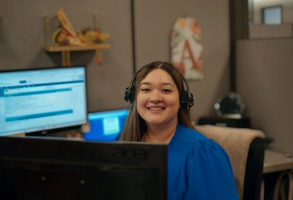 SNAP team member at her desk